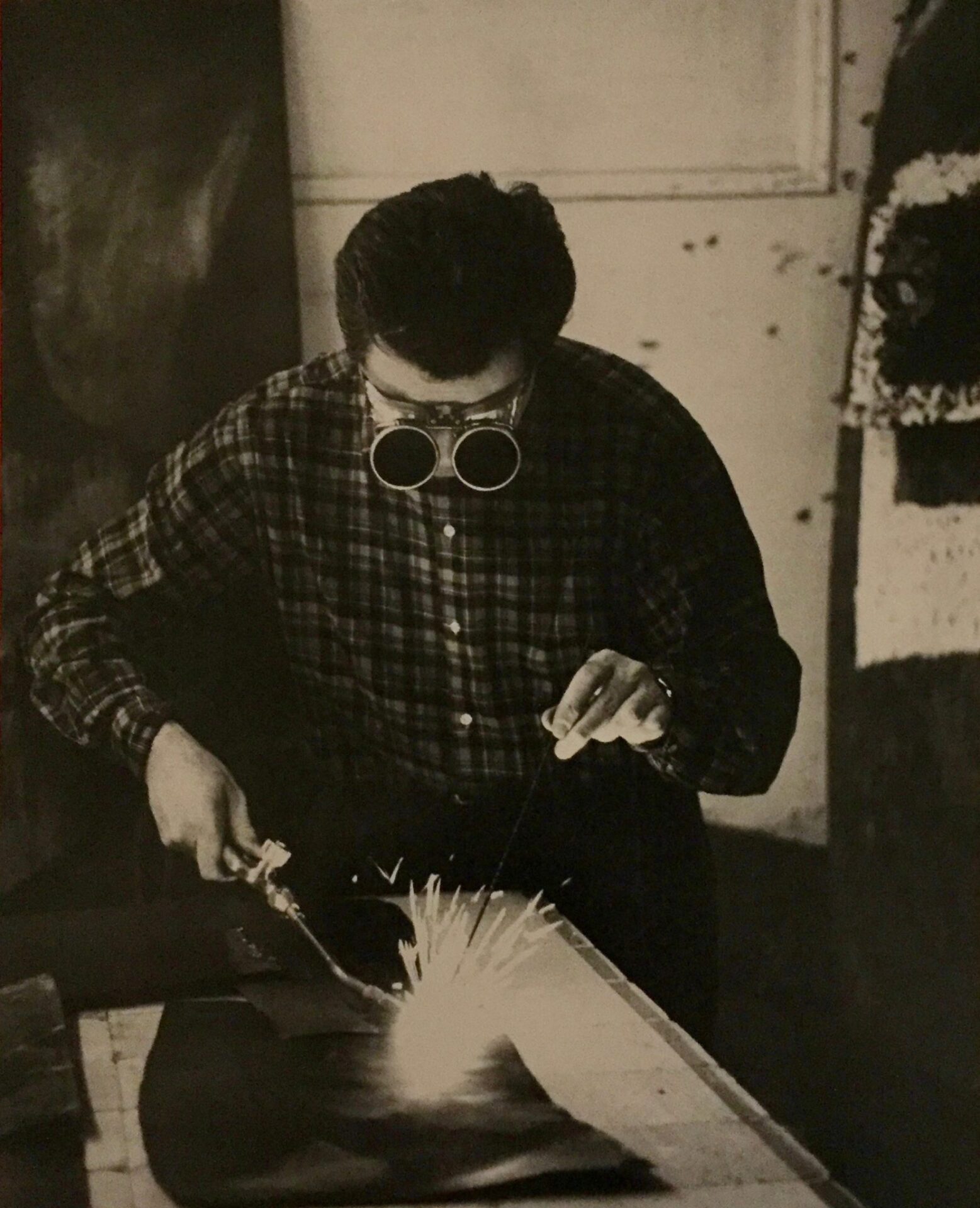 Alberto Burri welding in his studio, Rome, c.a. 1958